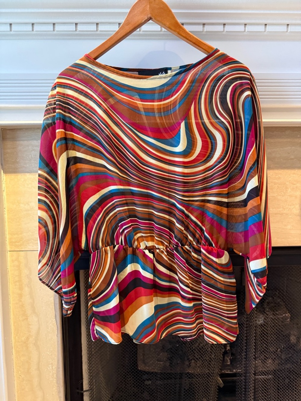 Multicolor Swirl Peplum Blouse - Vibrant Stripe Print